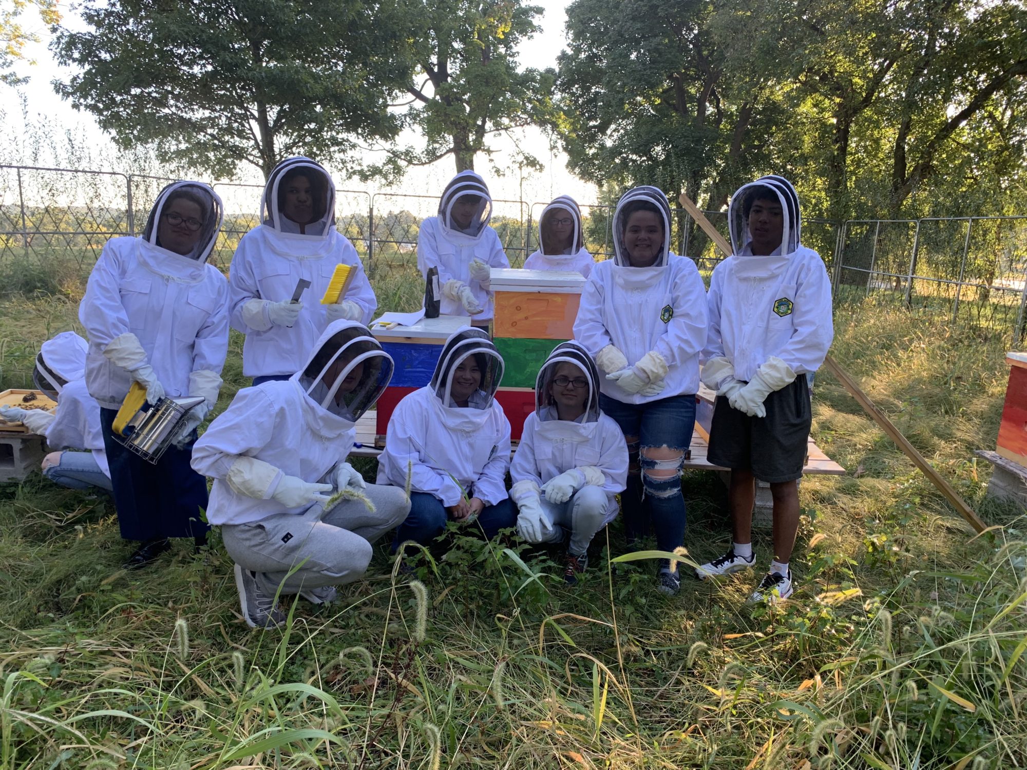 Stonecypher students in beekeeping gear